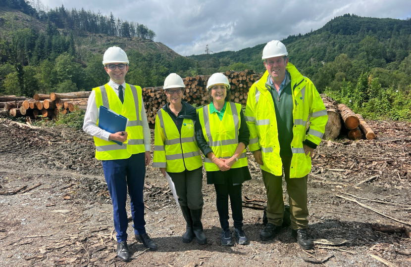 Janet Finch-Saunders MS, with Dylan Williams, Land and Asset Manager, NRW, and Kath McNulty, Team Leader Forest Operations, NRW, in a section of the Gwydir forest by Betws y Coed